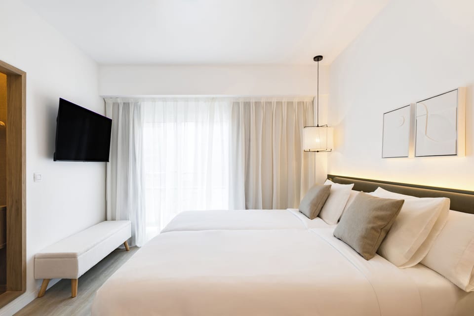 Down comforters, minibar, desk, laptop workspace
