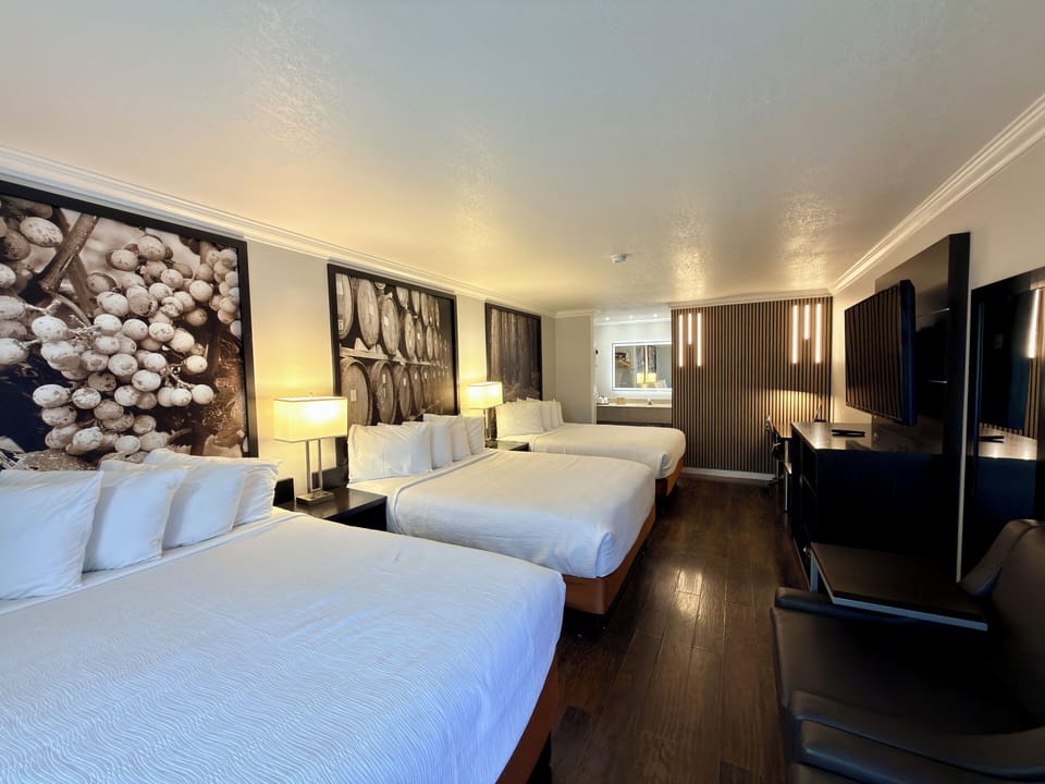 Standard Room, Multiple Beds | Pillowtop beds, in-room safe, desk, laptop workspace