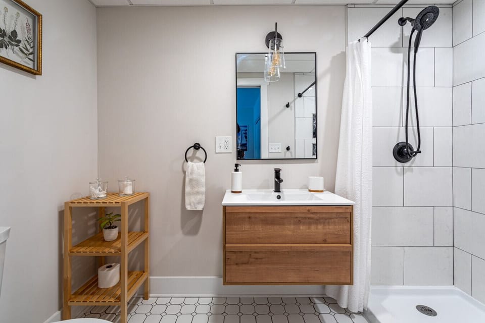 Full bathroom on lower level attached to bedroom