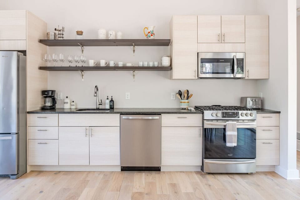 Monochromatic kitchen with brand new appliances
