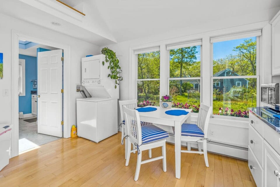 Your private kitchenette with a Keurig & K-cups, fridge, microwave, toaster, all the dish ware and utensils you'd need, lots of natural light, and seating for 3 at the dining table.