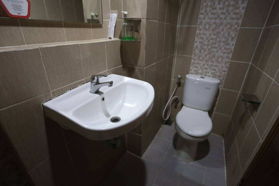 Economy Double Room | Bathroom | Towels, soap