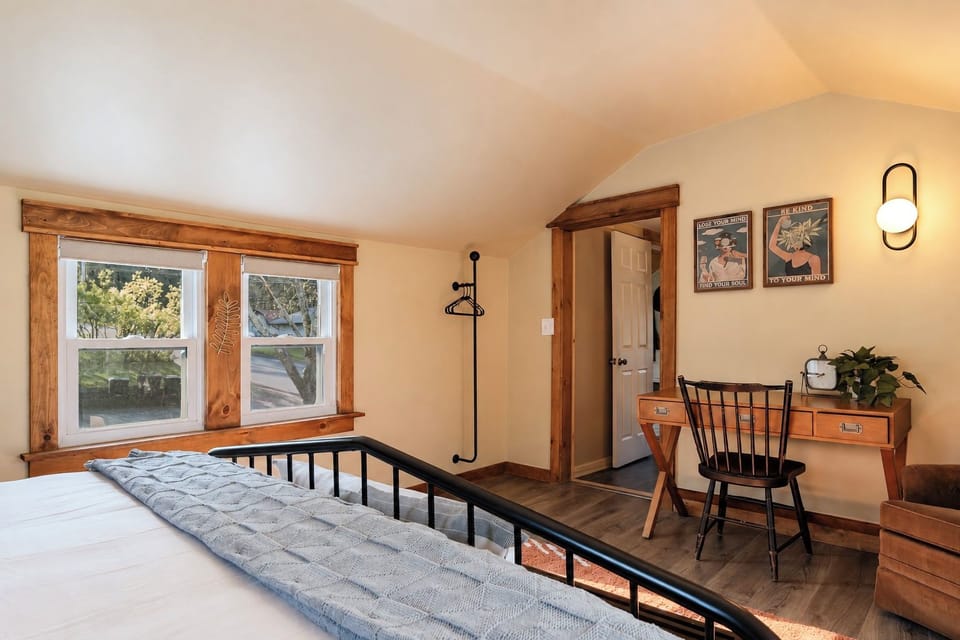 A peaceful bedroom with space to unpack, settle in, and make yourself at home.