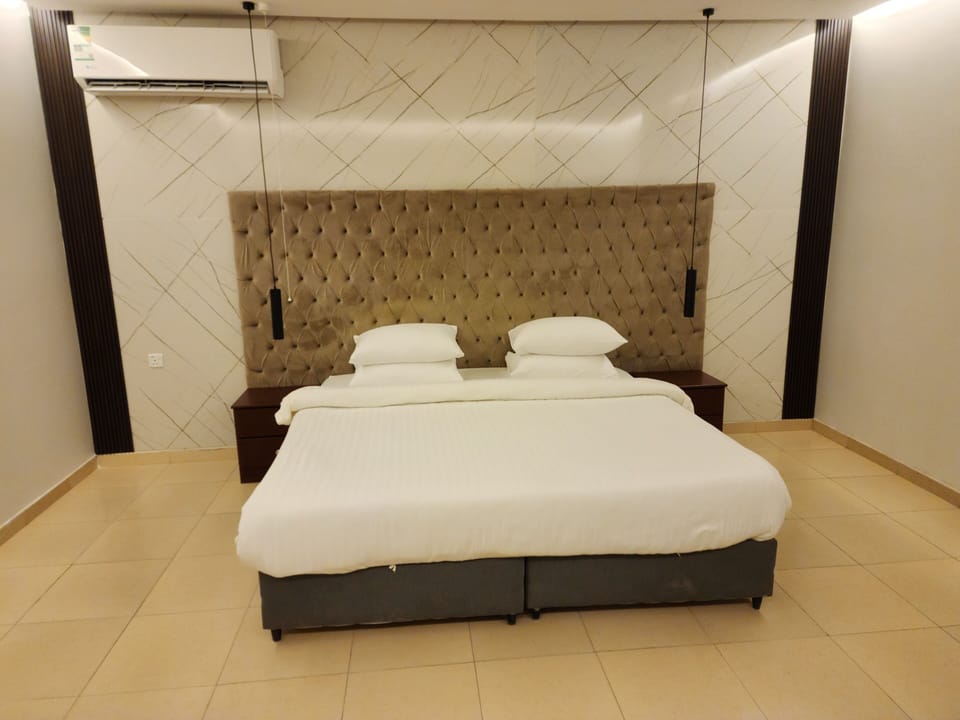 Design Apartment, Kitchen | Pillowtop beds, blackout drapes, iron/ironing board, free rollaway beds