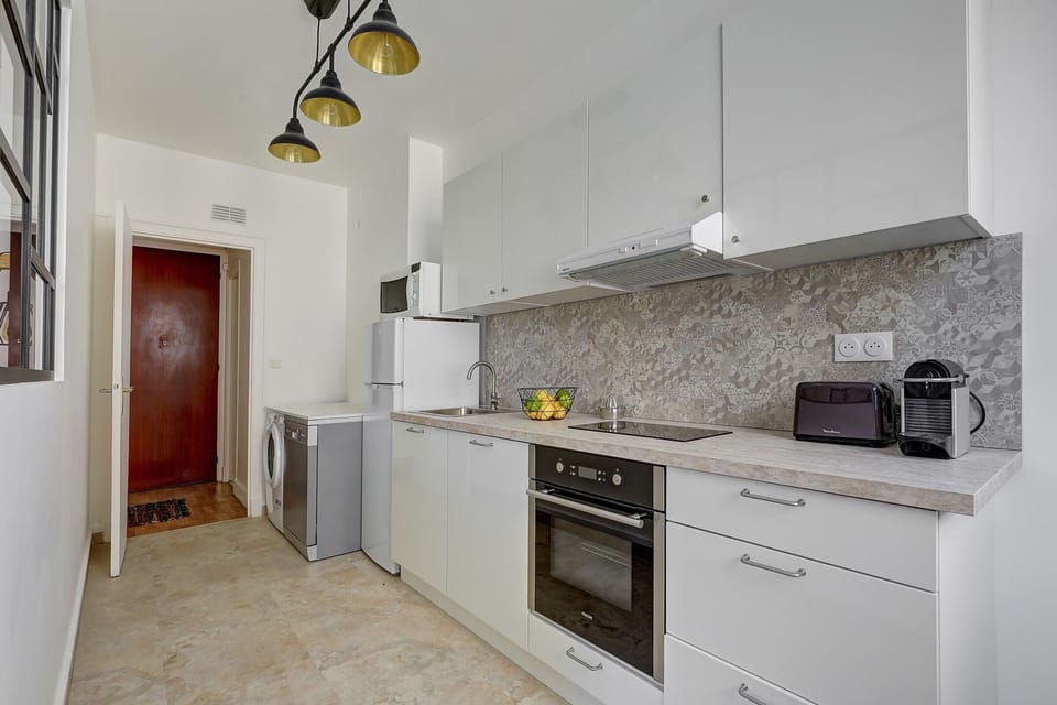 The kitchen is fully equipped to prepare a simple meal