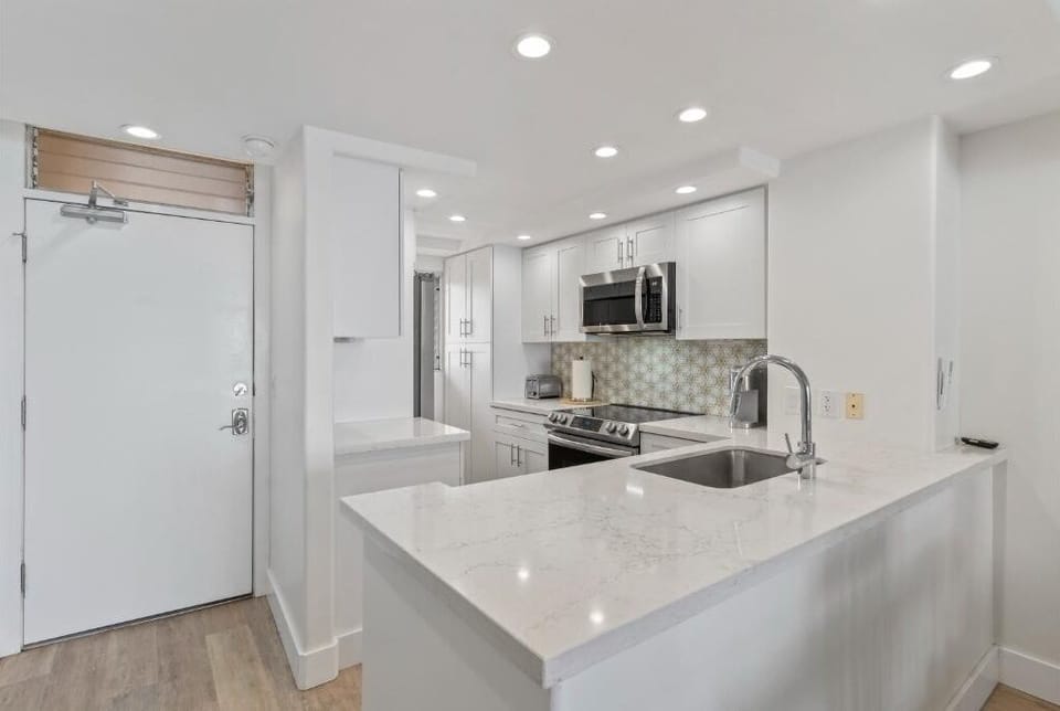Condo, 2 Bedrooms | Private kitchen | Coffee/tea maker, fridge, oven, toaster