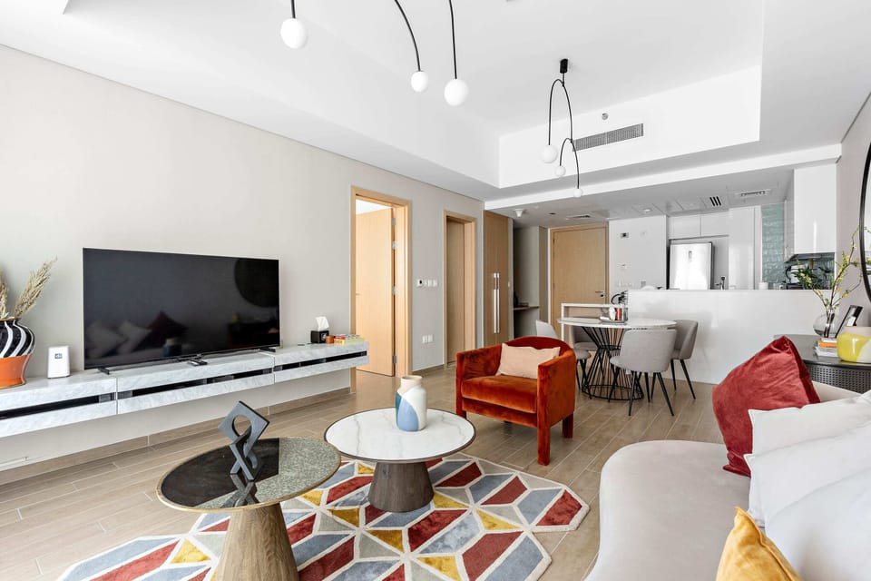 Panoramic Apartment | Living area | 50-inch Smart TV with digital channels