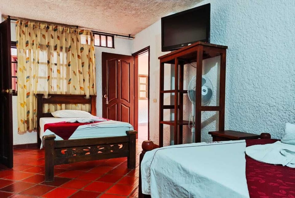 Standard Triple Room, Garden View | Free WiFi, bed sheets