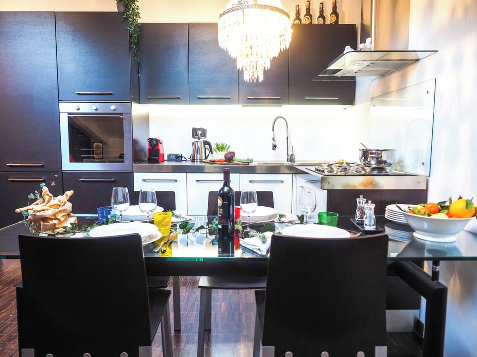 Apartment | Private kitchen | Espresso maker, electric kettle, dining tables