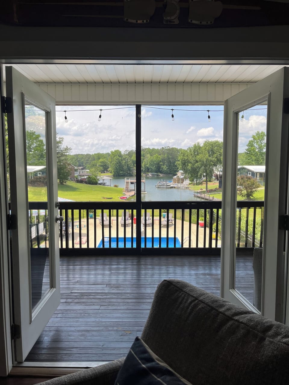 Love this view of the pool and the lake from the family room.