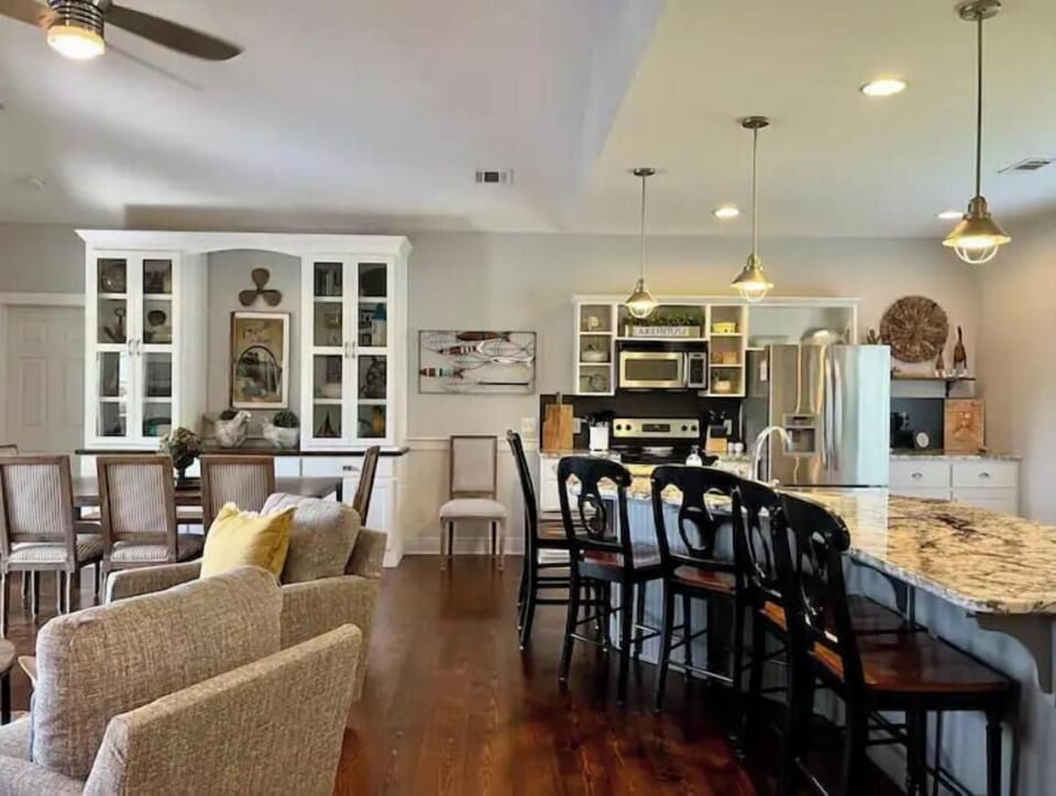 Large kitchen island is great for serving or additional seats. 