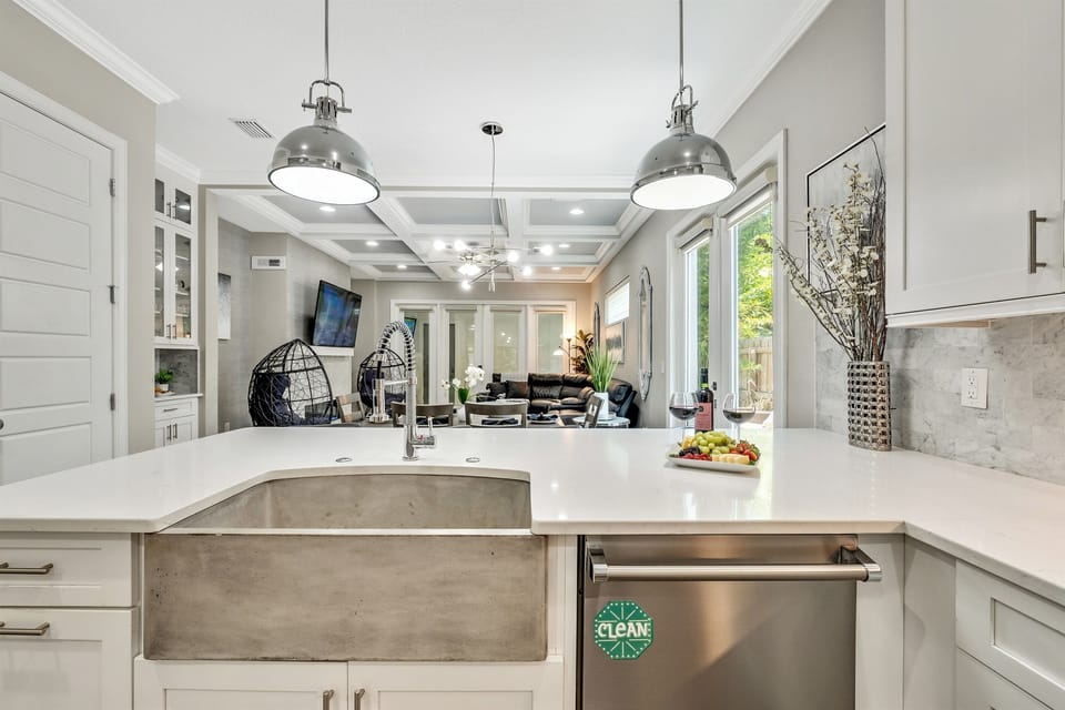 Every detail, from the sleek countertops to the stainless steel fixtures, has been meticulously chosen to create an environment that is both functional and aesthetically pleasing.