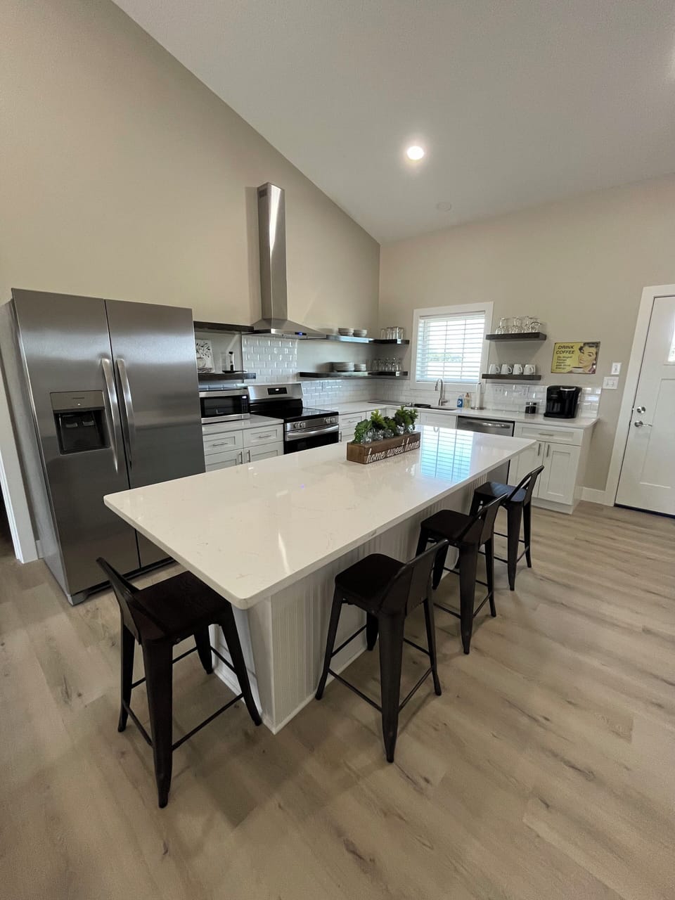 spacious kitchen with new appliances.