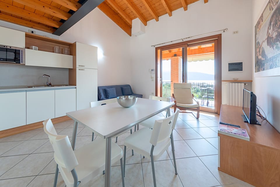 Apartment, Pool View | In-room dining