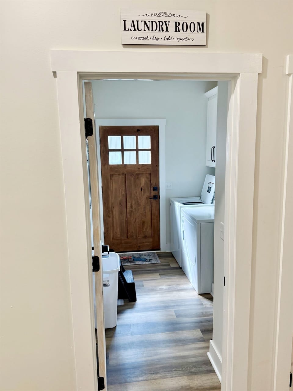 Our laundry room has an exterior access as well as the washer and dryer.