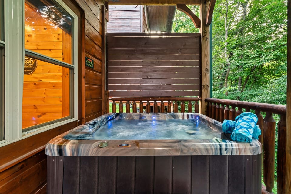 Relax or melt your cares away in the hot tub on the back deck.