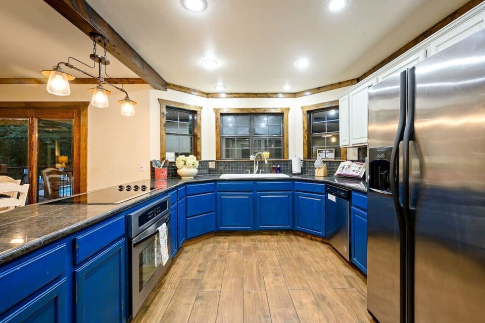 Bright and bold: elevate your cooking space with blue cupboards.