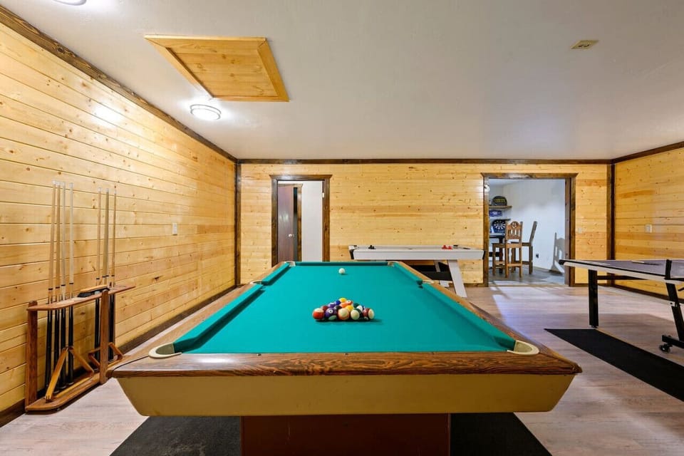 Cue up for fun and relaxation with our timeless pool table.