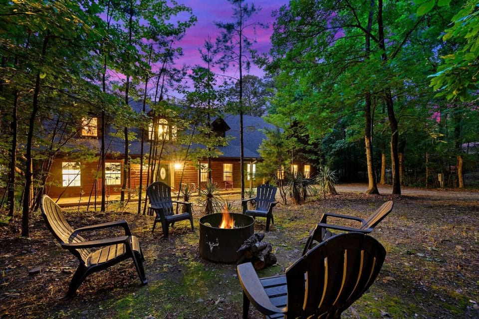 Gather `round and warm up at our cozy cabin fire pit.