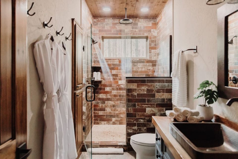 Refresh and Revitalize: Start your day with a refreshing shower in our serene bathroom