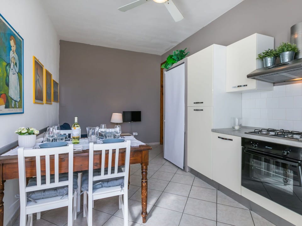 Furniture, Property, Ceiling Fan, Cabinetry, Table, Lighting, Countertop, Interior Design, Home Appliance, Kitchen Appliance