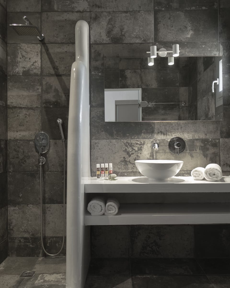 Divine Double, Sea/Pool View | Bathroom | Shower, rainfall showerhead, free toiletries, hair dryer