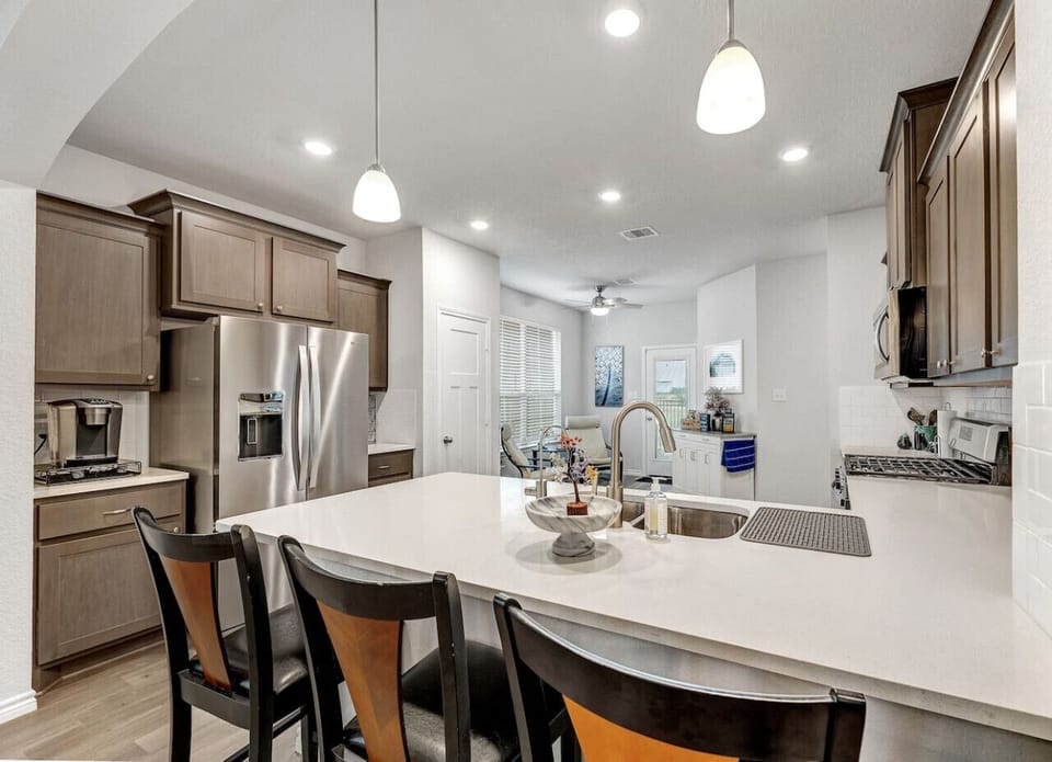 Spacious kitchen with oversized island and open layout—easy to cook and stay connected with the family