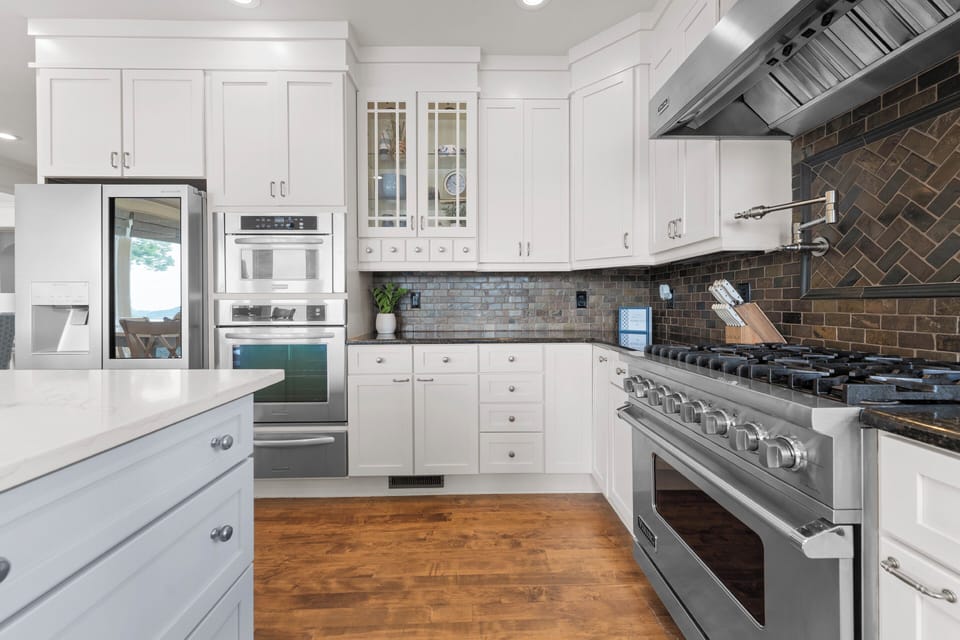 Fully stocked kitchen with large island seating for 6. 