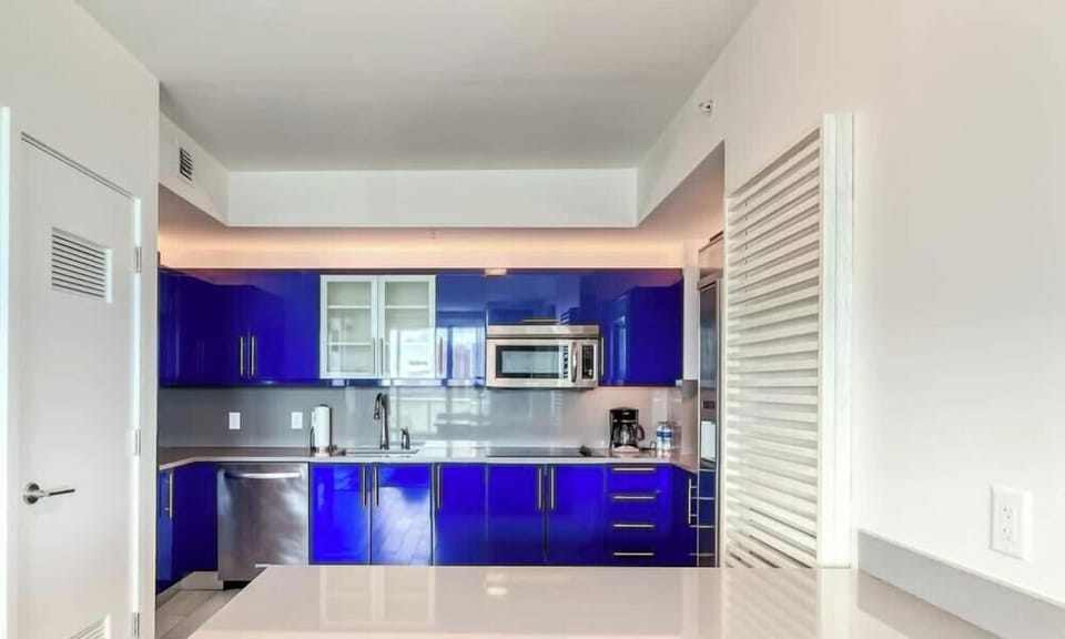 Fully Appointed Kitchen with Nespresso Machine, Coffee Maker & everything you need if you choose to cook.  Access to Room Service as well.  Washer/Dryer Inside Unit