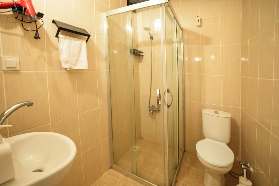 Suite, City View | Bathroom | Free toiletries, hair dryer, slippers, towels