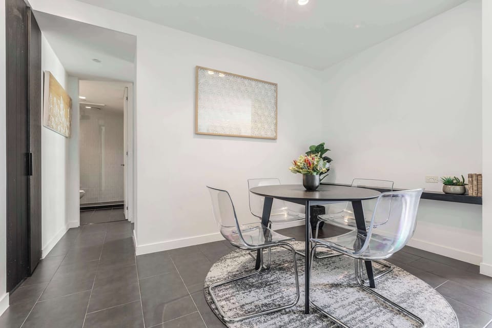 DINING ROOM: A classic, bright, and inviting space with seating for four.