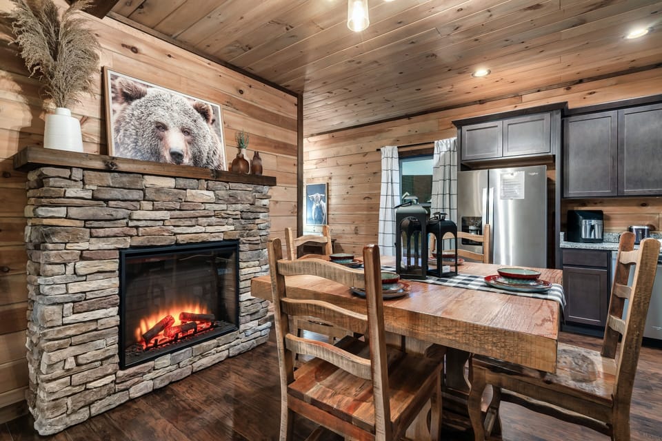 A beautiful fireplace, topped with decorative accents that add to its charm.