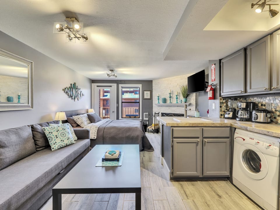 Kitchen Kitchen Stainless Steel Refrigerator, Microwave/Range, Electric Stove/Oven, Upgraded Cabinetry, Combination Washer/Dryer, Coffee Maker, Crock Pot, Blender, Sofa, Coffee Table, Upgraded Countertops & Backsplash