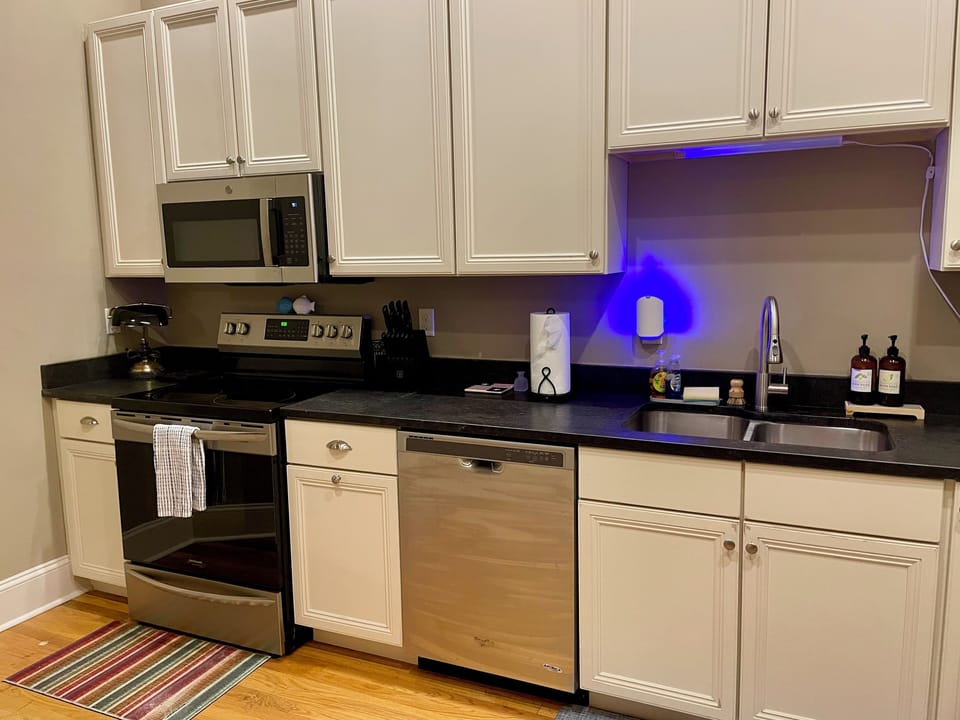 Kitchen is fully stocked with barware, service for 8, and kids dishes/utensils