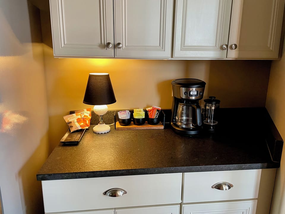 Coffee, tea, filters, and sweeteners are provided