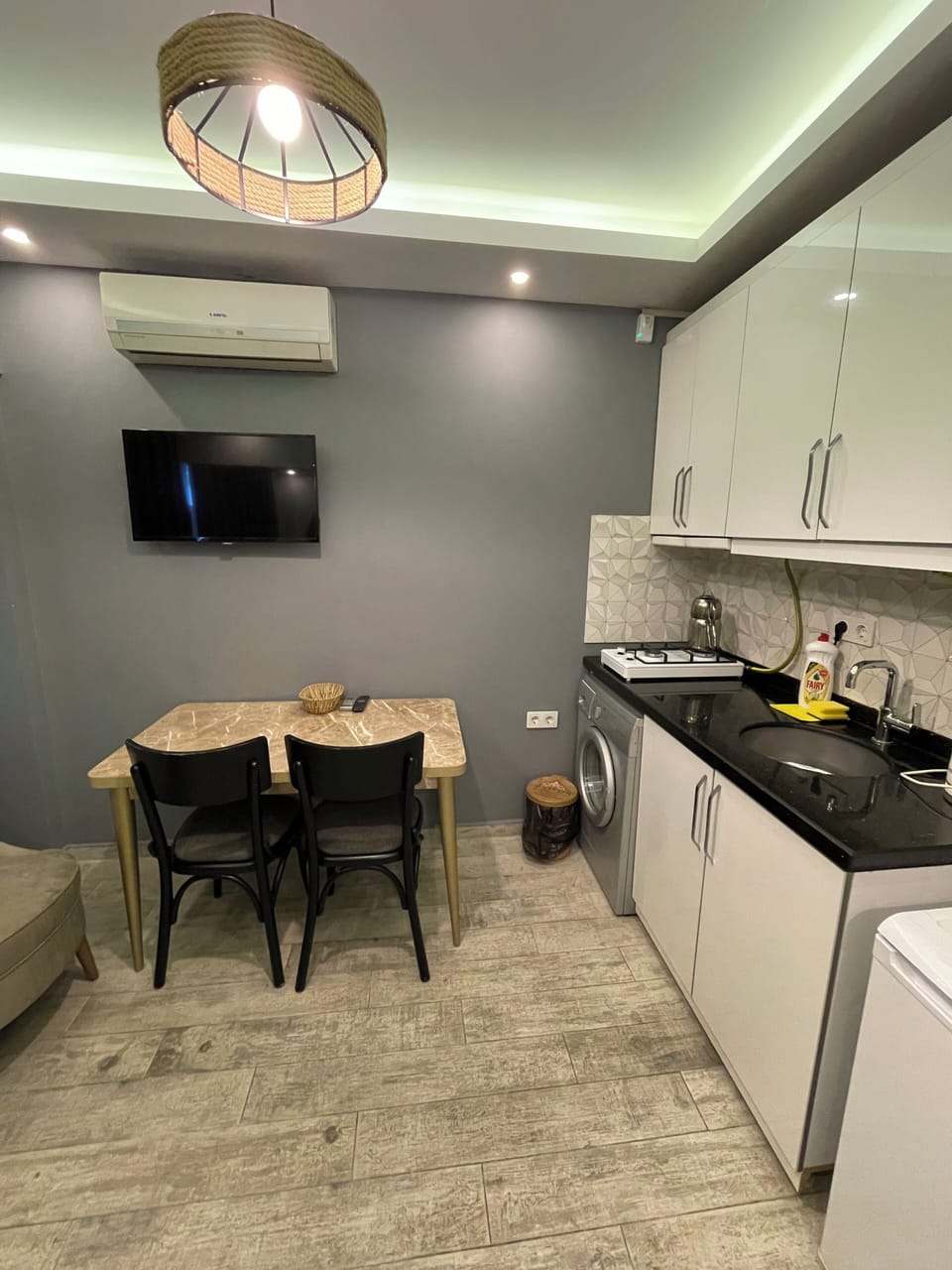 Luxury Apartment | Living area | 80-inch LCD TV with satellite channels