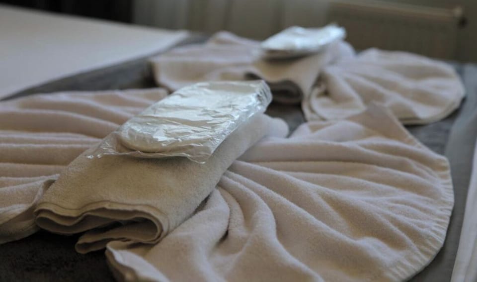 Egyptian cotton sheets, premium bedding, blackout drapes, soundproofing