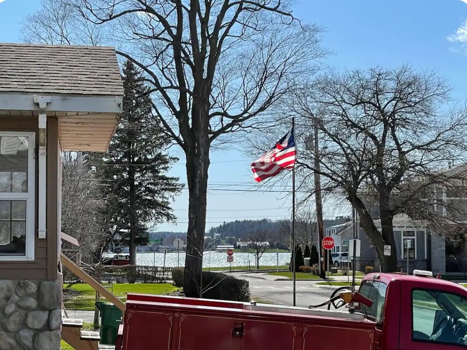 The river can be seen from the porch.
