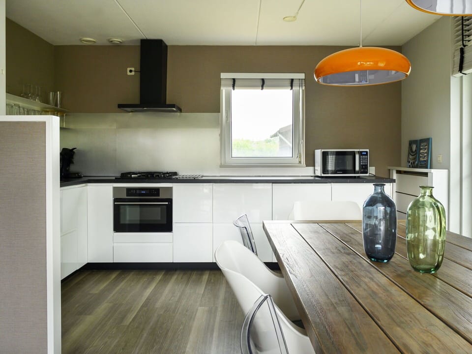 Cabinetry, Property, Countertop, Furniture, Window, Kitchen Appliance, Kitchen Stove, Kitchen, Wood, Building