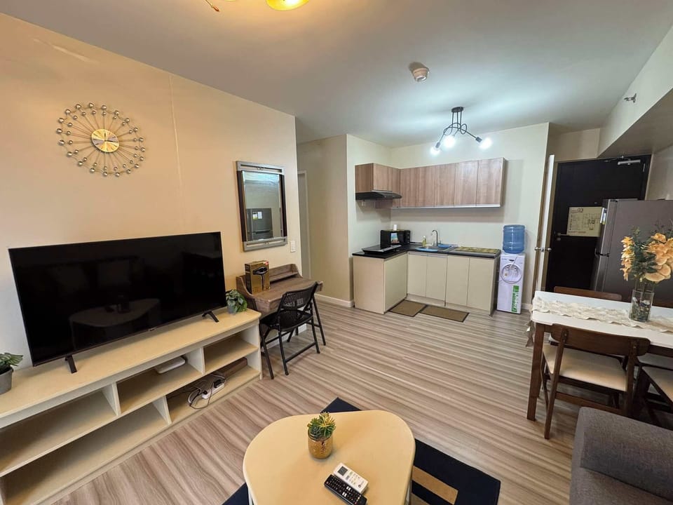 Family Condo, 2 Bedrooms, Pool Access, Partial Sea View | Living area | 55-inch Smart TV with cable channels, Netflix, streaming services