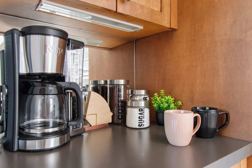 Brew your morning cup with the easy-to-use coffee maker! Fresh coffee is provided to jumpstart your day!