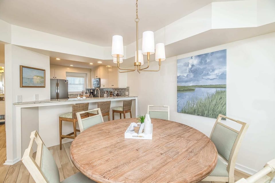 The dining room offers a seamless view of the ocean.