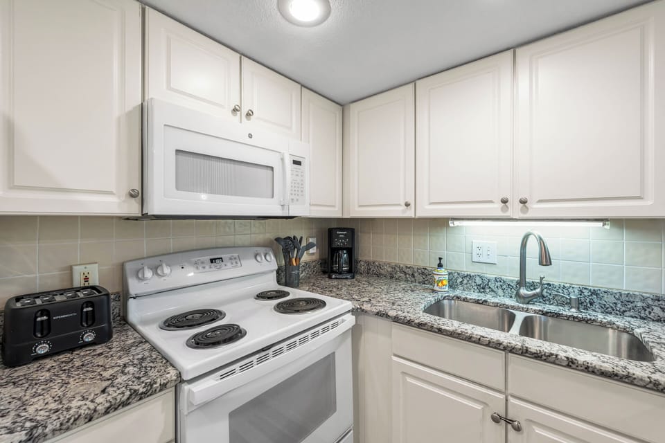Kitchen equipped with cooking needs