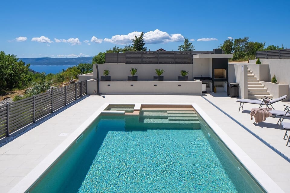 A heated pool with a fully automated salt electrolysis system
