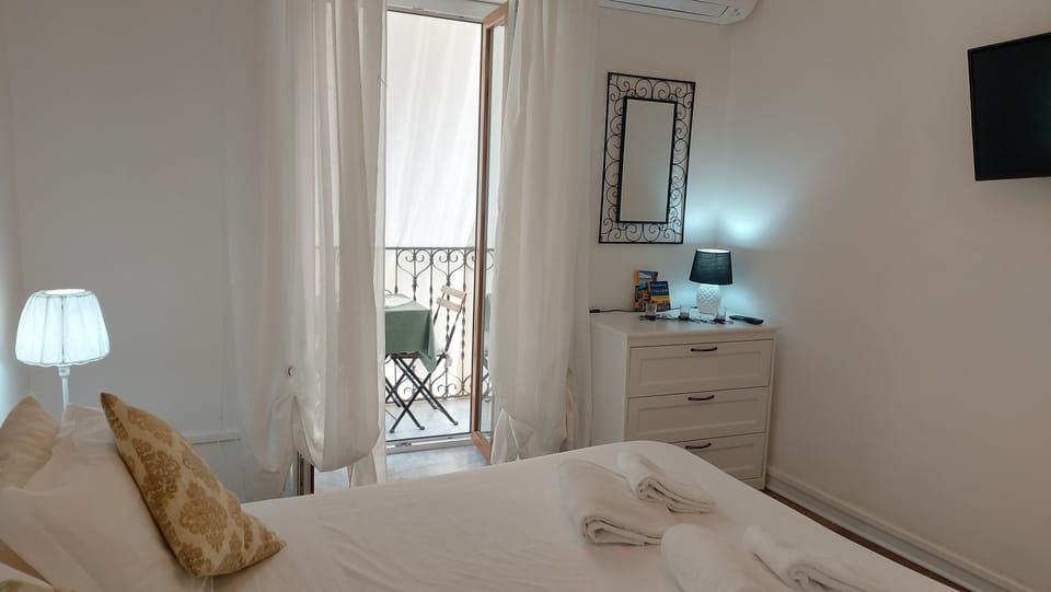 Economy Apartment | 1 bedroom, individually decorated, blackout drapes, iron/ironing board