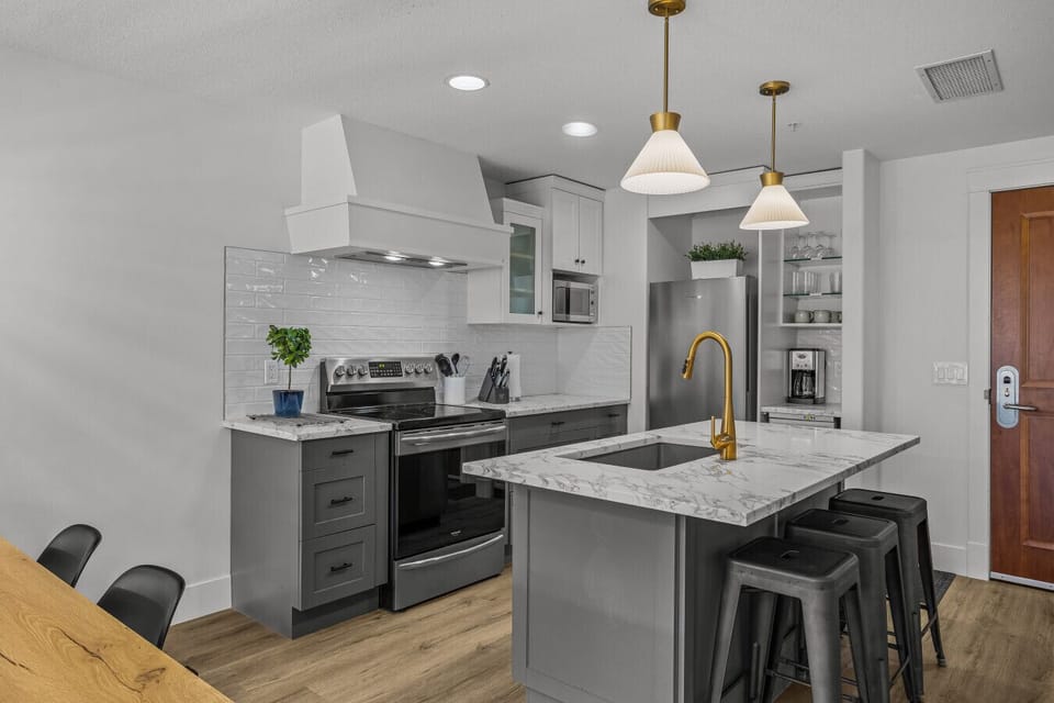Sleek modern kitchen with all new stainless steel appliances