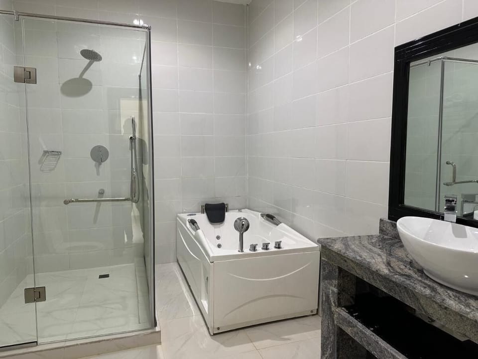 Hair dryer, slippers, towels, soap