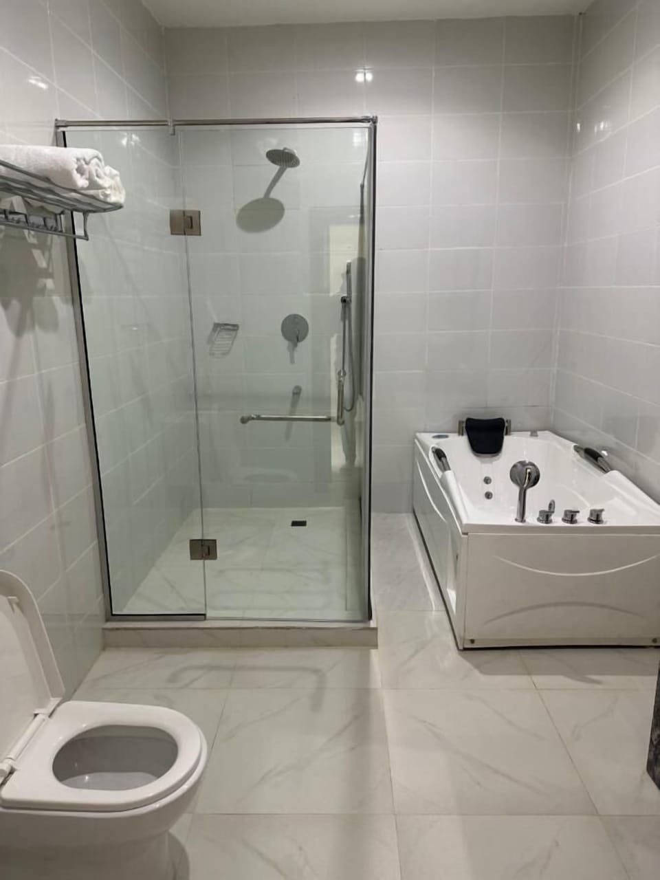Deluxe Room, Balcony, City View | Bathroom | Hair dryer, slippers, towels, soap