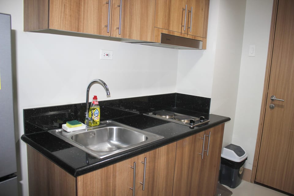 Family Condo, Balcony, Pool View | Private kitchen | Full-size fridge, microwave, oven, stovetop