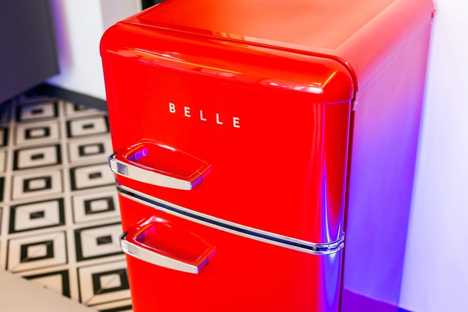 Fridge, microwave, cookware/dishes/utensils, dining tables